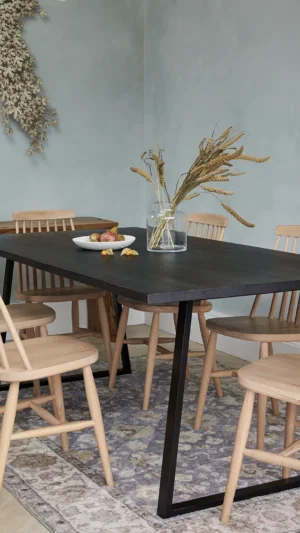 Scandinavian dining chairs around a contemporary dining table