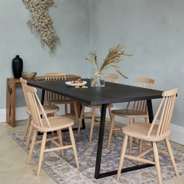 Scandinavian dining chairs around a contemporary dining table