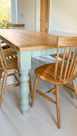 Farmhouse traditional rectangular dining table with Nordic dining chairs