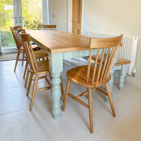 Farmhouse traditional rectangular dining table with Nordic dining chairs